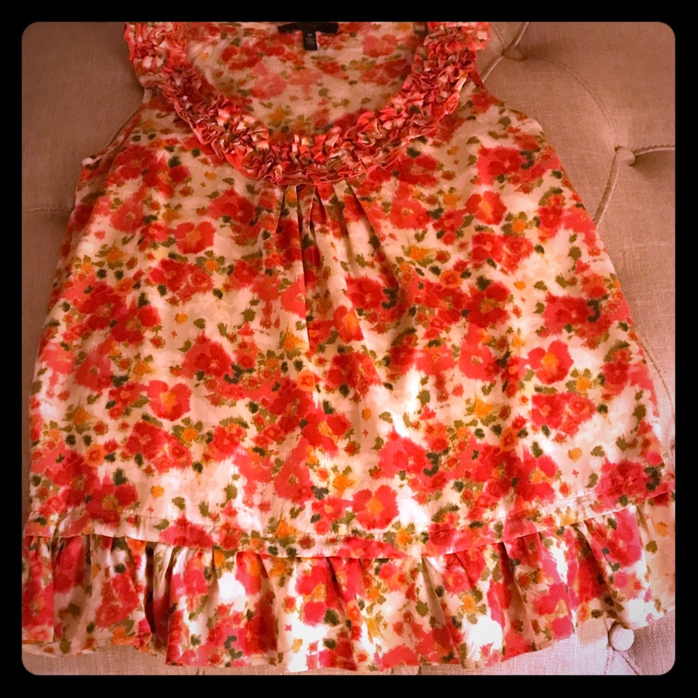 sleeveless flowered blouse